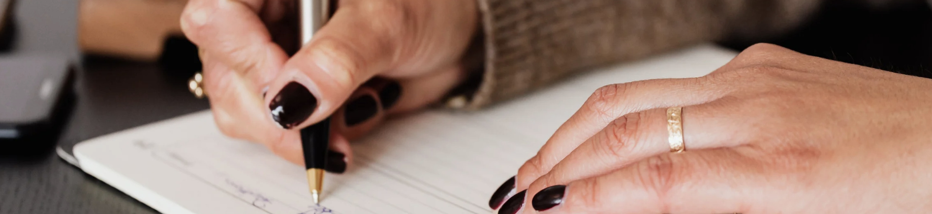 Counselling training notes laid out on a desk, representing reflection, growth, and professional identity in counsellor training.